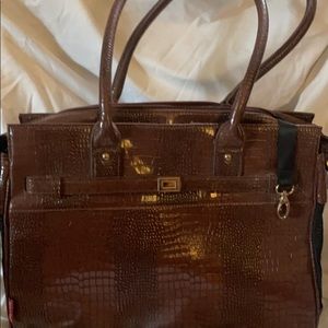 Brown patent leather, dog carrier bag